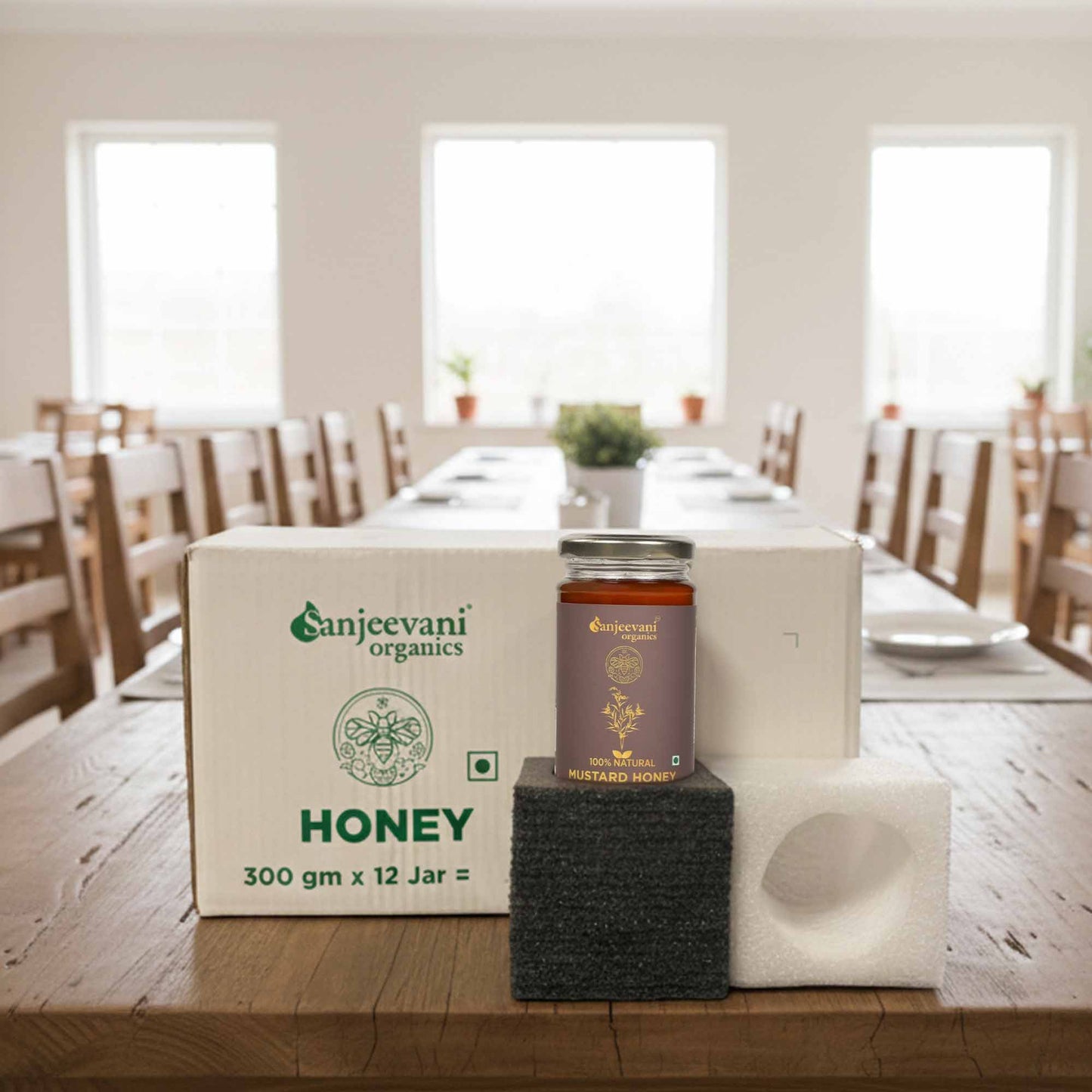 Barsana Magic and Organics honey packaging on a dining table with a blurred background
