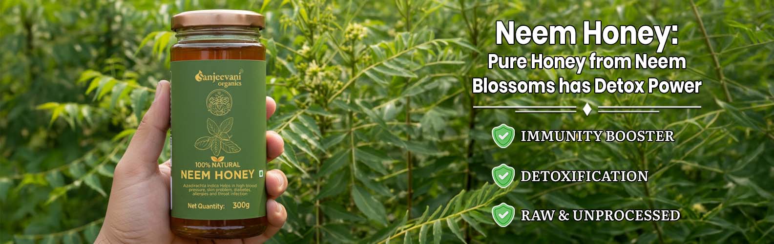 Barsana Magic and Hand holding a jar of Neem Honey with neem leaves in the background