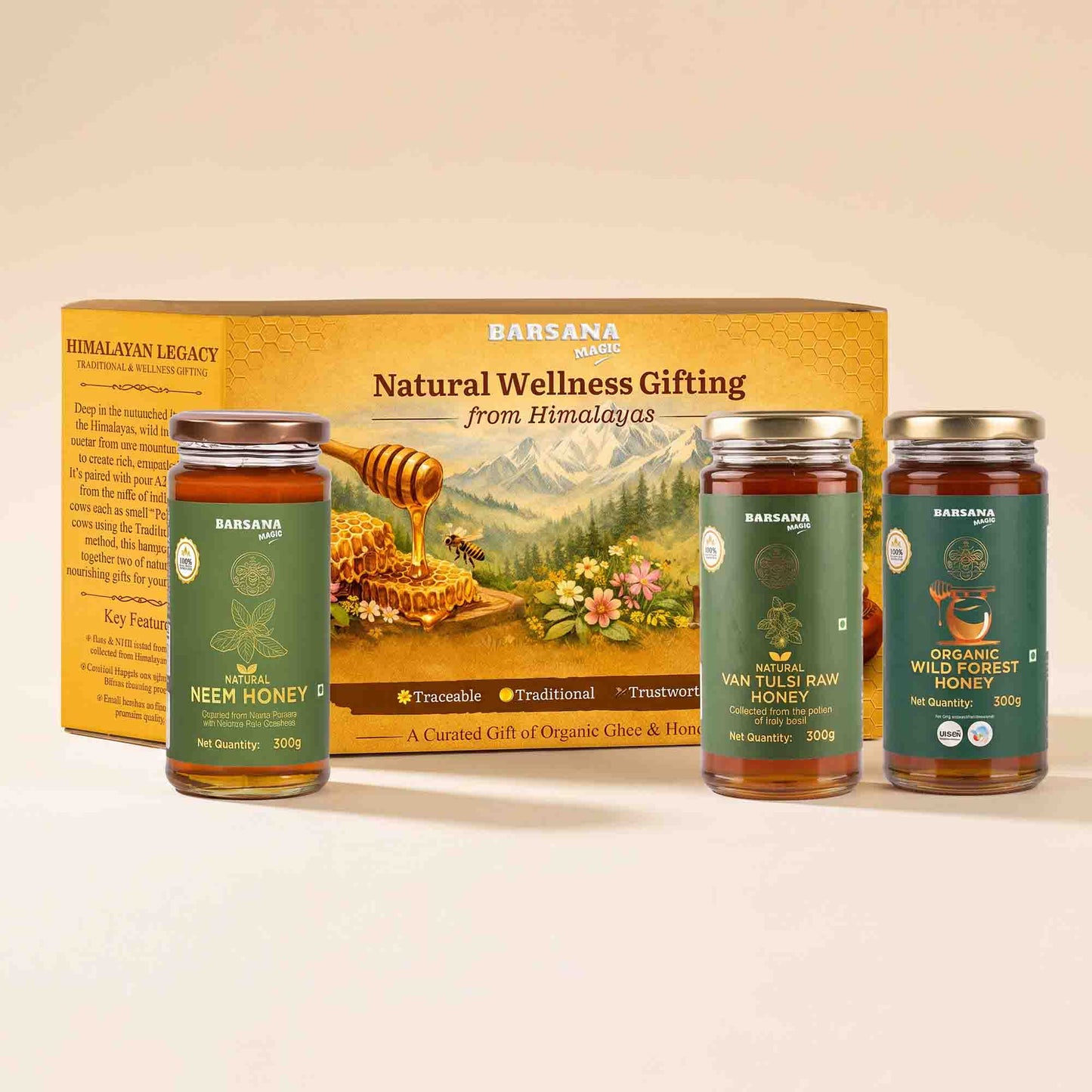 Barsana Magic and Legacy Natural Wellness Gifting set featuring a large yellow gift box and three glass jars of honey: Neem Honey, Van Tules Raw Honey, and Organic Wild Rose Honey, arranged on a light beige background.