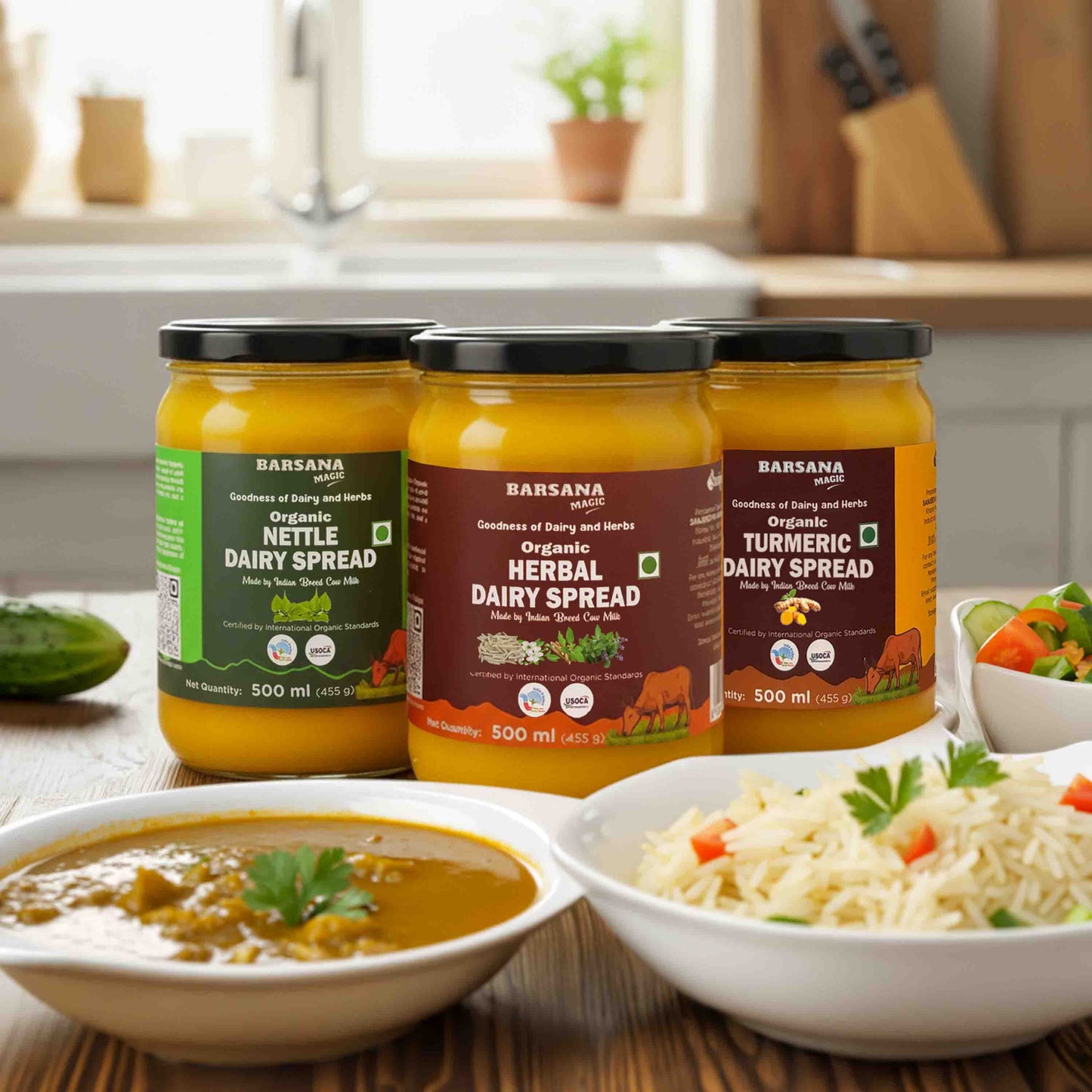 Barsana Magic and  Three jars of dairy spreads on a kitchen counter with bowls of food.