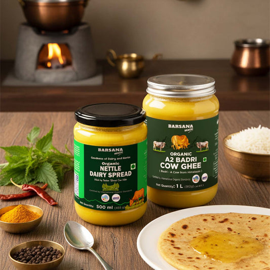 Barsana Magic and Two jars of Barsana organic dairy products on a wooden table with food items.