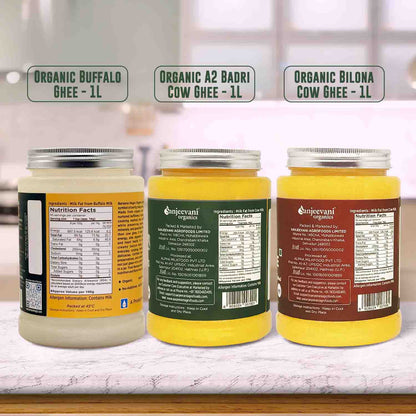 Barsana Magic and Three jars of organic ghee with labels on a white surface.