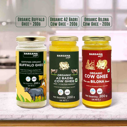 Barsana Magic and Three jars of Organic Ghee on a kitchen counter with labels indicating different types of ghee.