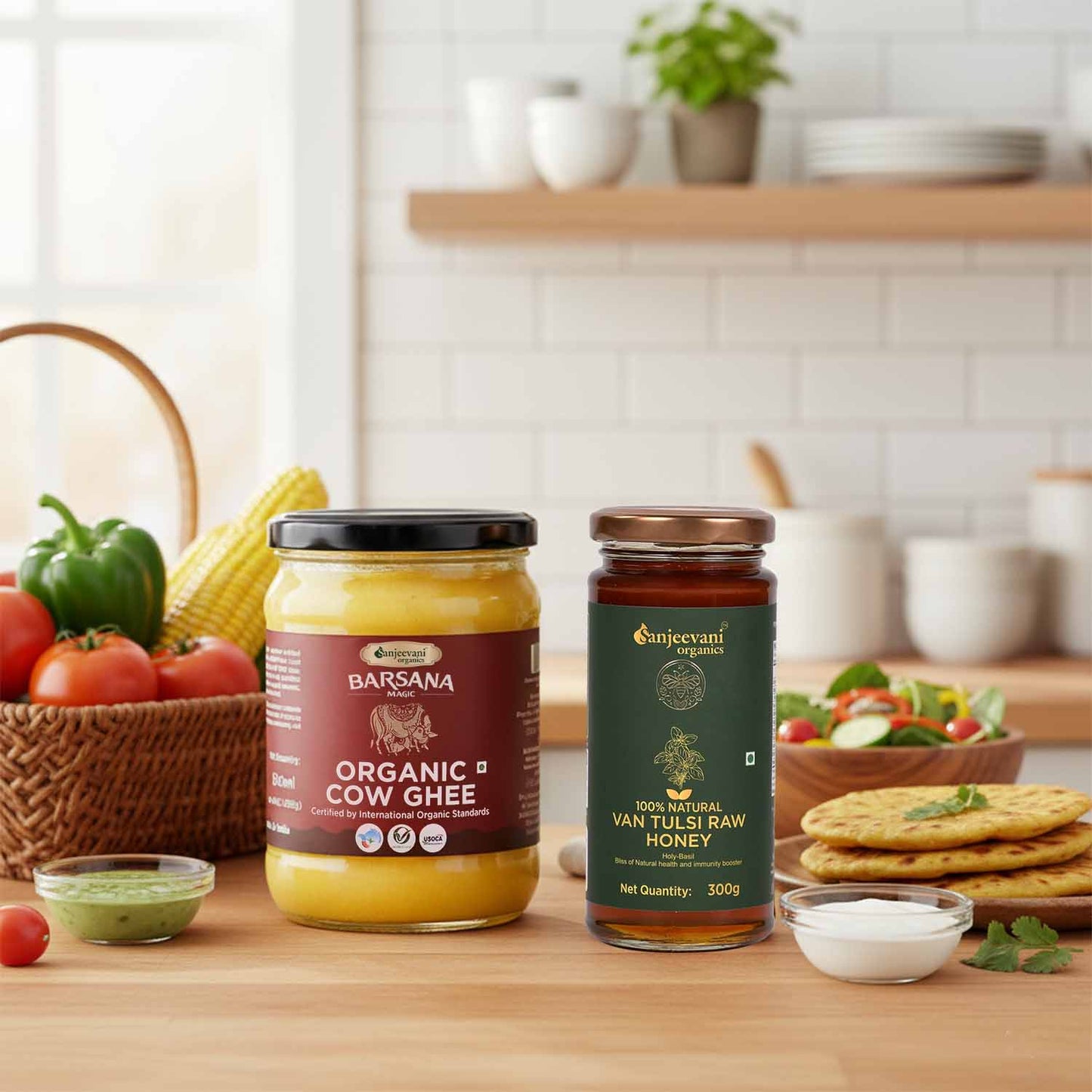 Barsana Magic and Two jars of organic products on a kitchen counter with vegetables and a salad in the background.