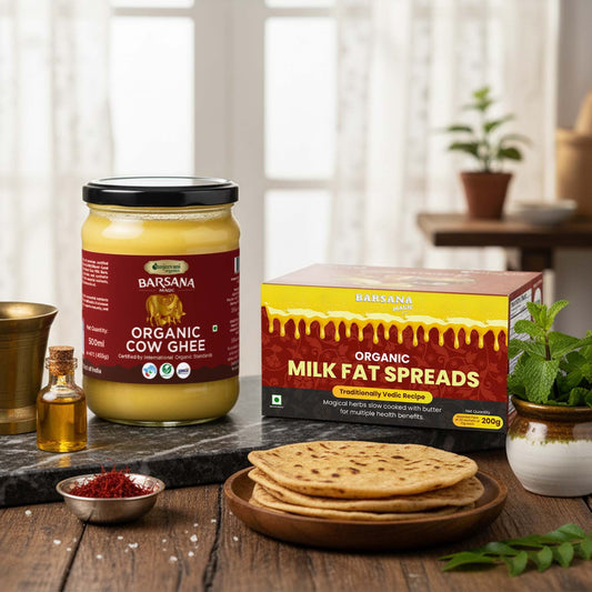 Barsana Magic and Jar of Barsana Organic Cow Ghee and packaging on a wooden table with flatbreads.