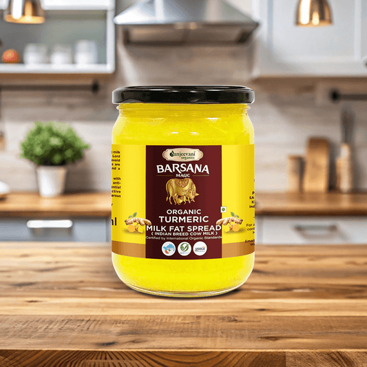 Vibrant yellow Organic Turmeric Milk Fat Spread in a 500ml jar, crafted from pure Indian cow milk and turmeric.