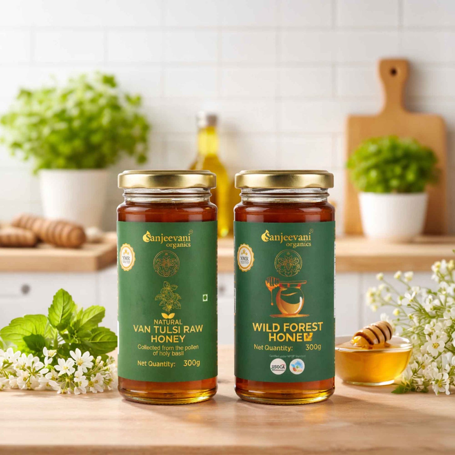 Barsana Magic and Two jars of Sanjeevani Organics honey on a kitchen counter with flowers and plants in the background.