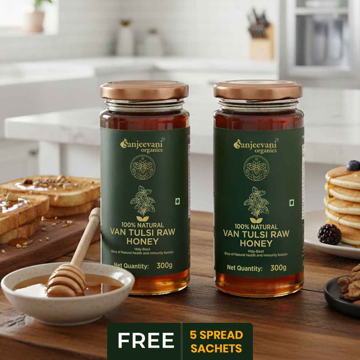 Barsana Magic and Two jars of Van Tulsi Raw Honey on a kitchen counter with a bowl of honey and toast.