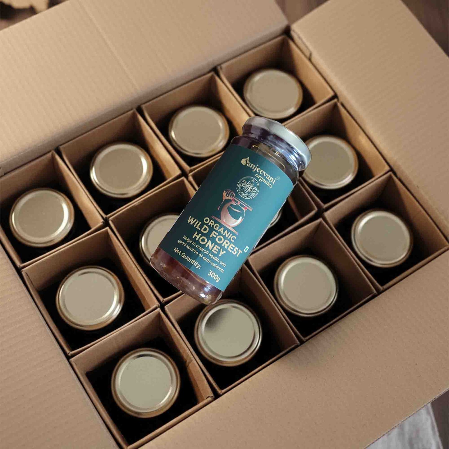 Barsana Magic and Box of jars with a jar of honey on top