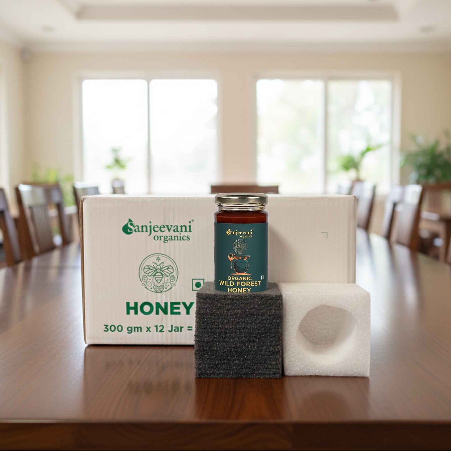 Barsana Magic and Organics honey jar on a wooden table with a blurred background