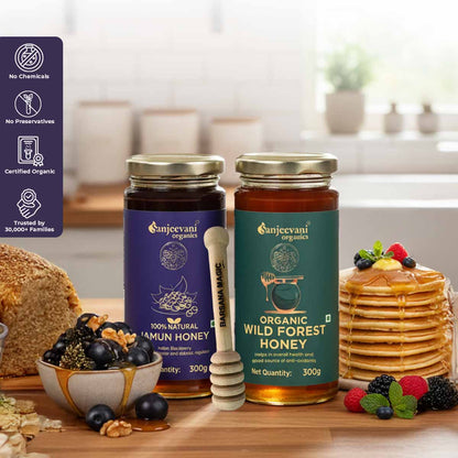 Barsana Magic and Two jars of Sanjeevani honey on a wooden table with a kitchen background